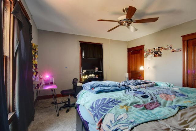 1412 Oak St, Quincy, IL 62301 - bedroom featuring light colored carpet and ceiling fan
