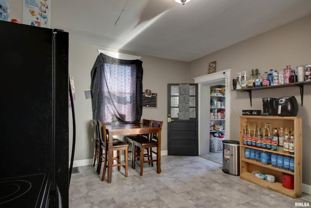 1412 Oak St, Quincy, IL 62301 - dining room with tile patterned floors and baseboards