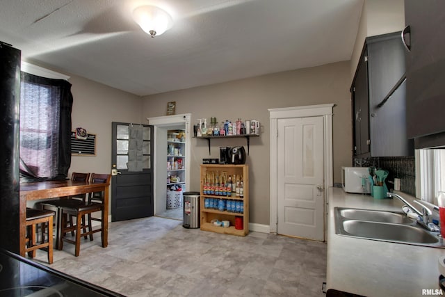 1412 Oak St, Quincy, IL 62301 - kitchen featuring a sink and light countertops
