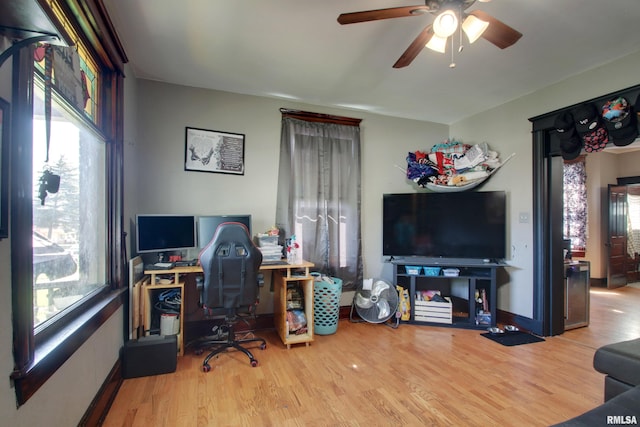 1412 Oak St, Quincy, IL 62301 - office space featuring plenty of natural light, wood finished floors, and ceiling fan