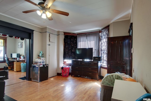 1412 Oak St, Quincy, IL 62301 - living area featuring ornamental molding, a desk, light wood finished floors, and ceiling fan