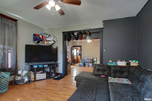 1412 Oak St, Quincy, IL 62301 - living room featuring a ceiling fan and light wood-type flooring