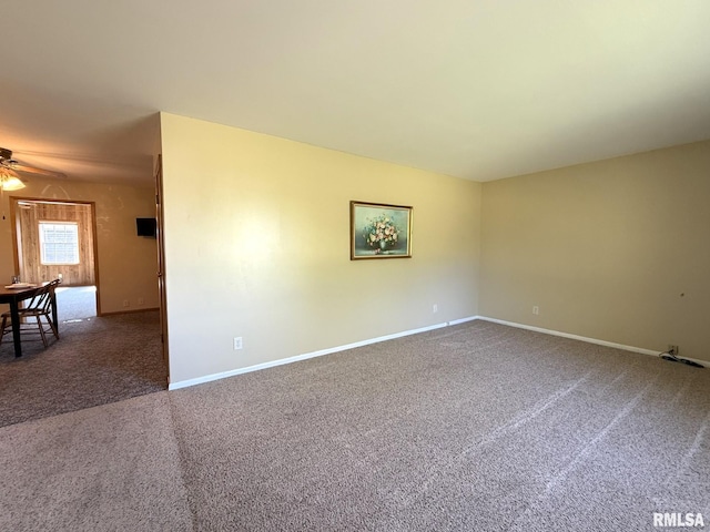 903 N Fearing Ave, Abingdon, IL 61410 - unfurnished room featuring carpet and ceiling fan