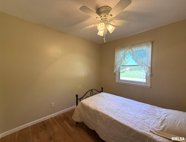 903 N Fearing Ave, Abingdon, IL 61410 - bedroom featuring wood finished floors and a ceiling fan