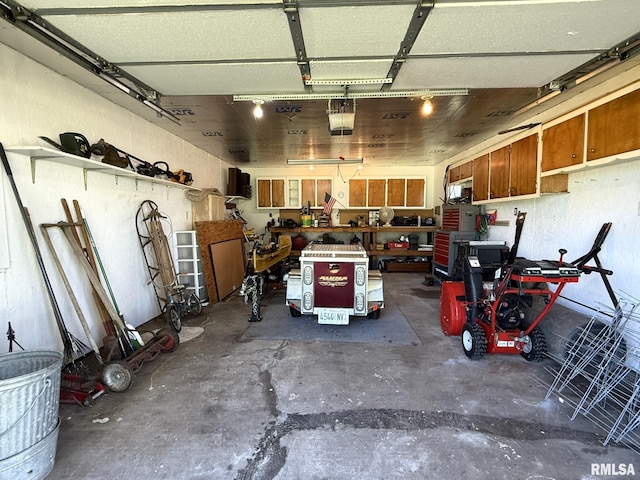 903 N Fearing Ave, Abingdon, IL 61410 - garage featuring a garage door opener