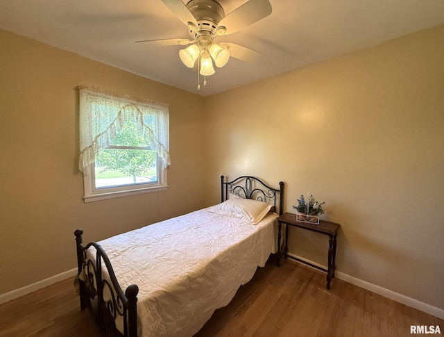 903 N Fearing Ave, Abingdon, IL 61410 - bedroom featuring wood finished floors and a ceiling fan