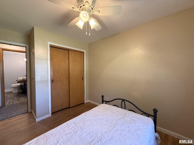 903 N Fearing Ave, Abingdon, IL 61410 - bedroom featuring wood finished floors, a closet, and ceiling fan