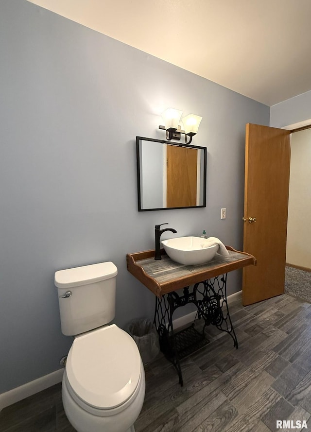 903 N Fearing Ave, Abingdon, IL 61410 - half bath featuring wood finished floors