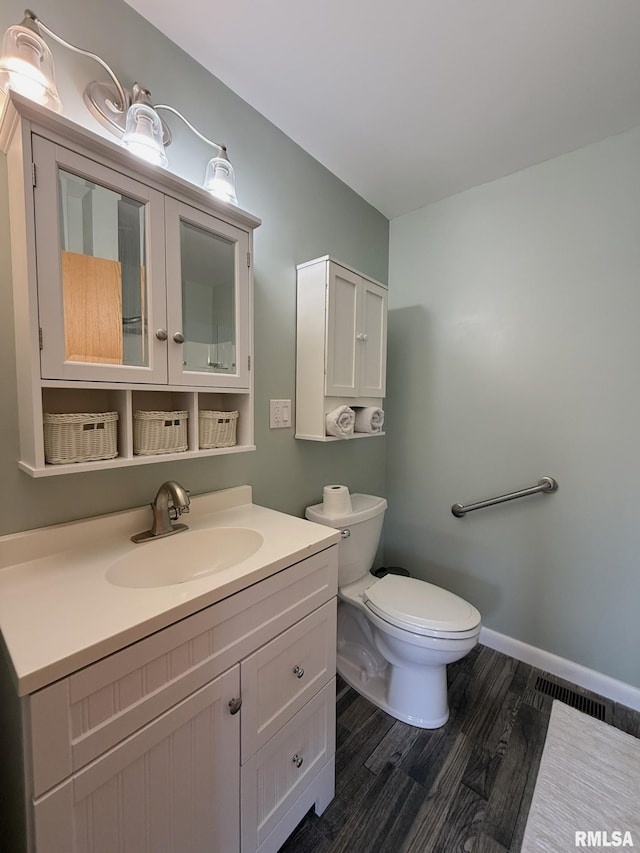 903 N Fearing Ave, Abingdon, IL 61410 - bathroom with wood finished floors and vanity