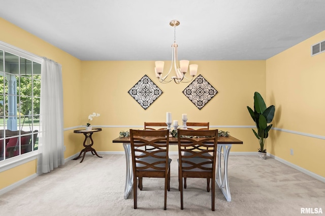 1860 Mayfield Rd, Chatham, IL 62629 - carpeted dining room with a chandelier and baseboards