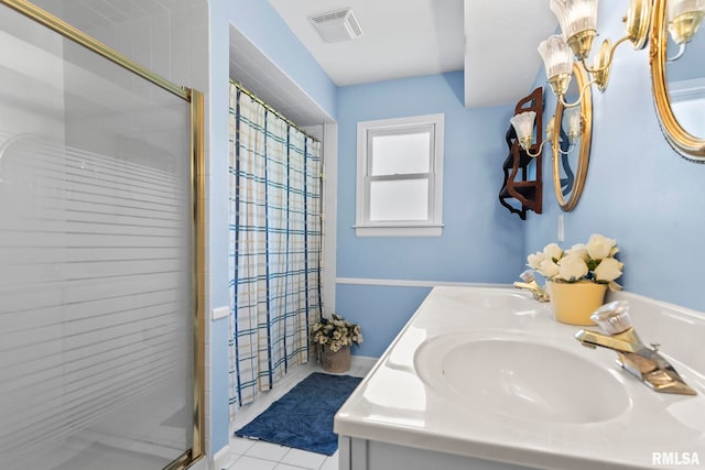 1860 Mayfield Rd, Chatham, IL 62629 - full bath featuring a shower stall, double vanity, and tile patterned floors
