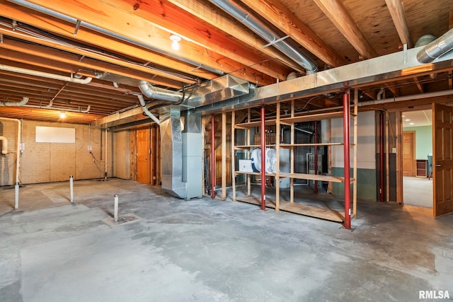 1860 Mayfield Rd, Chatham, IL 62629 - unfinished below grade area with heating unit and heating fuel