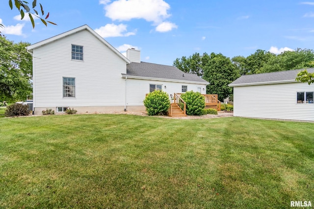 1860 Mayfield Rd, Chatham, IL 62629 - rear view of house with a wooden deck, a lawn, and a chimney