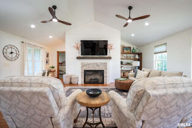 623 Jasper Rd, Centralia, IL 62801 - living area featuring a ceiling fan, lofted ceiling, a stone fireplace, wood finished floors, and recessed lighting