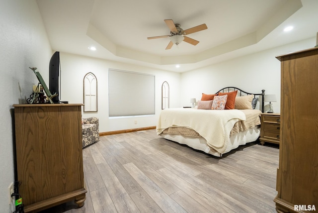 623 Jasper Rd, Centralia, IL 62801 - bedroom featuring a raised ceiling, light wood finished floors, recessed lighting, and a ceiling fan