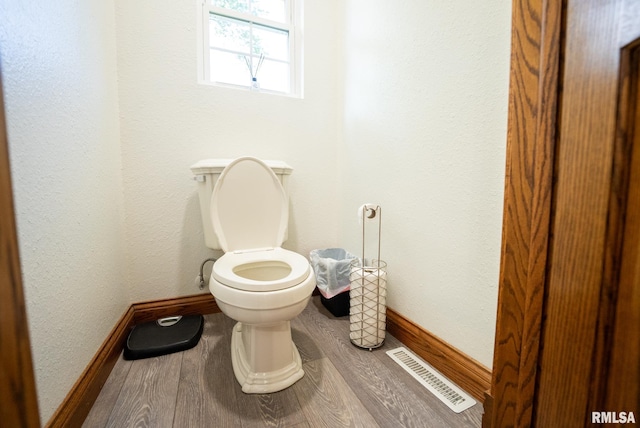 623 Jasper Rd, Centralia, IL 62801 - bathroom with wood finished floors and toilet