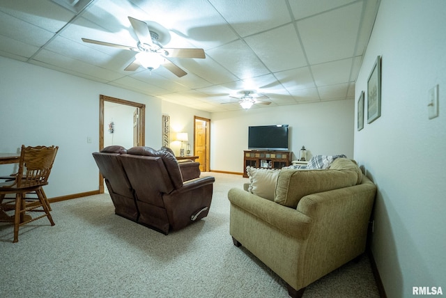 623 Jasper Rd, Centralia, IL 62801 - living room featuring a ceiling fan, a paneled ceiling, and carpet floors