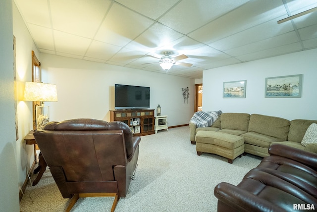 623 Jasper Rd, Centralia, IL 62801 - living room featuring a drop ceiling, a ceiling fan, and carpet