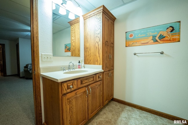 623 Jasper Rd, Centralia, IL 62801 - bathroom featuring vanity and baseboards