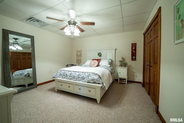 623 Jasper Rd, Centralia, IL 62801 - carpeted bedroom with a paneled ceiling and ceiling fan