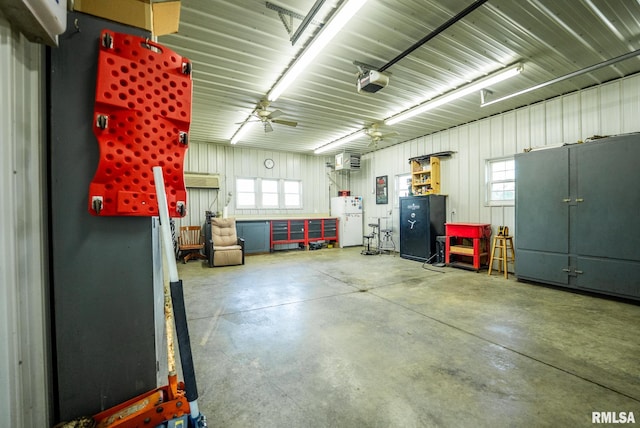 623 Jasper Rd, Centralia, IL 62801 - garage featuring freestanding refrigerator and a garage door opener