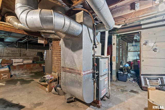 215 N Wilson St, Girard, IL 62640 - unfinished basement featuring water heater and heating unit