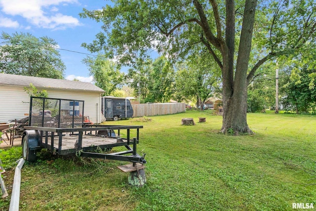 215 N Wilson St, Girard, IL 62640 - view of green lawn featuring a storage shed