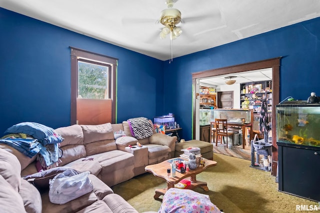 215 N Wilson St, Girard, IL 62640 - carpeted living area featuring ceiling fan