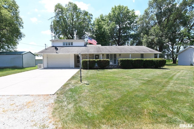 107 E Harrison St, Edinburg, IL 62531 - traditional-style home with concrete driveway, a front lawn, and an attached garage
