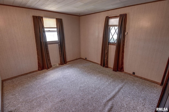 107 E Harrison St, Edinburg, IL 62531 - empty room with ornamental molding and carpet floors