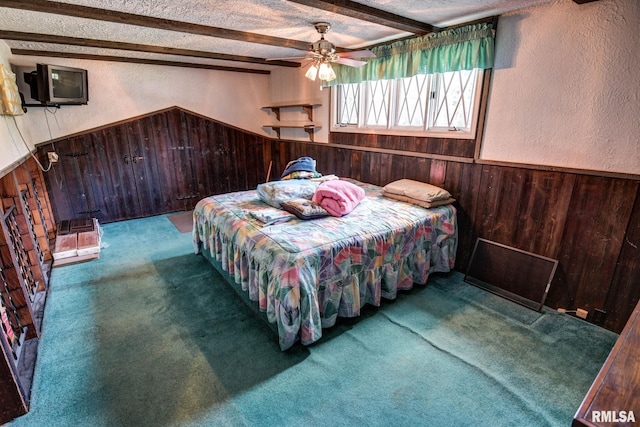 107 E Harrison St, Edinburg, IL 62531 - bedroom with wood walls, a textured wall, beam ceiling, carpet, and wainscoting