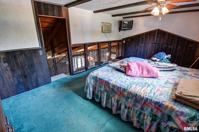 107 E Harrison St, Edinburg, IL 62531 - bedroom with carpet flooring, beamed ceiling, a textured ceiling, and a ceiling fan
