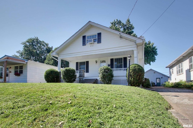1512 Locust St, Quincy, IL 62301 - view of front of home featuring covered porch, a front lawn, and driveway