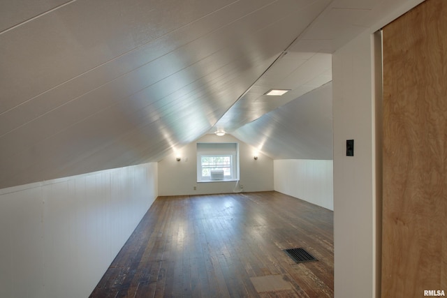 1512 Locust St, Quincy, IL 62301 - additional living space featuring hardwood / wood-style floors and vaulted ceiling