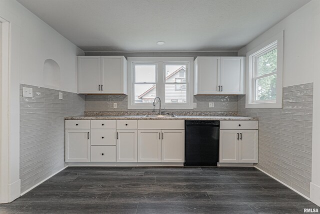 914 Pekin St, Lincoln, IL 62656 - kitchen with black dishwasher, white cabinets, dark wood-style floors, and backsplash