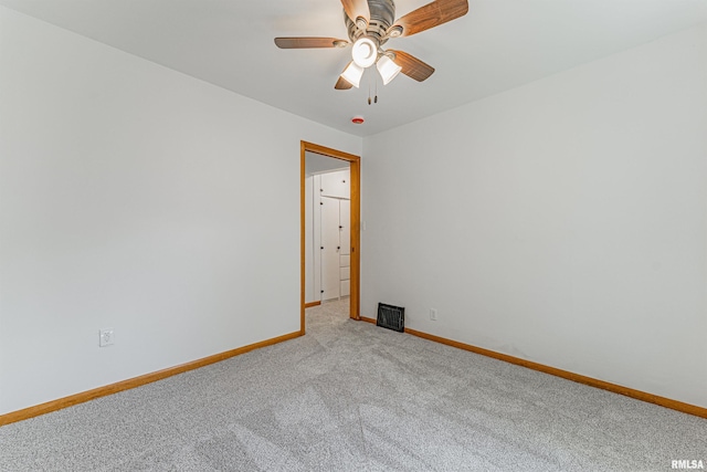 914 Pekin St, Lincoln, IL 62656 - unfurnished room featuring carpet and a ceiling fan