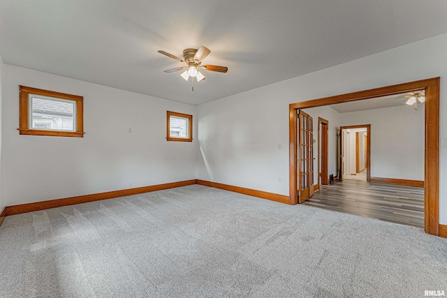 914 Pekin St, Lincoln, IL 62656 - unfurnished room featuring ceiling fan and carpet