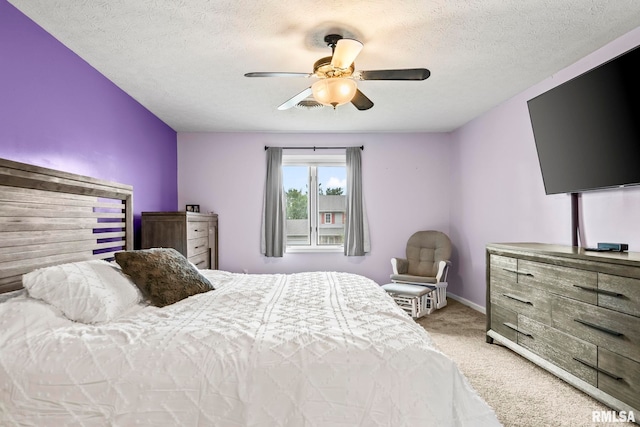 504 Windamere Dr, Sherman, IL 62684 - bedroom featuring light carpet, ceiling fan, and a textured ceiling
