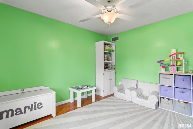 504 Windamere Dr, Sherman, IL 62684 - rec room featuring a ceiling fan and wood finished floors