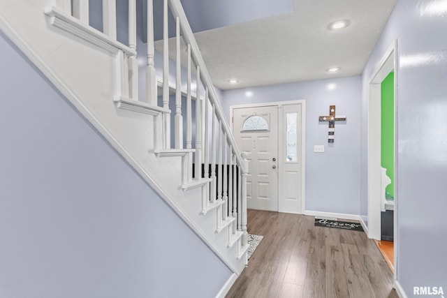 504 Windamere Dr, Sherman, IL 62684 - foyer featuring stairway, wood finished floors, and recessed lighting