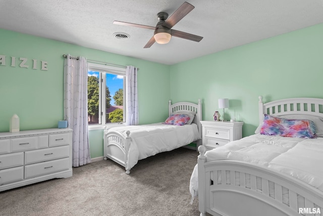 504 Windamere Dr, Sherman, IL 62684 - bedroom featuring light carpet, a textured ceiling, and a ceiling fan