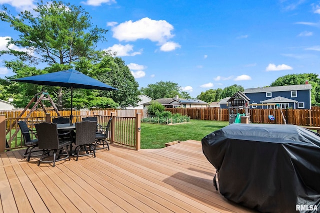 504 Windamere Dr, Sherman, IL 62684 - deck featuring a playground, a grill, outdoor dining area, and a fenced backyard