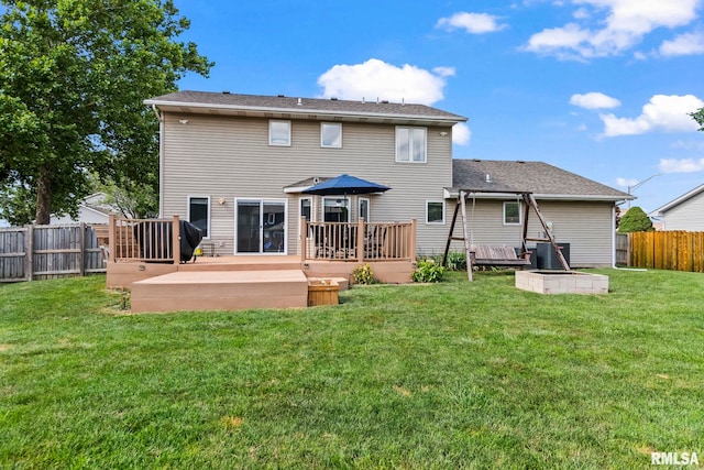 504 Windamere Dr, Sherman, IL 62684 - rear view of property featuring a fenced backyard and a wooden deck