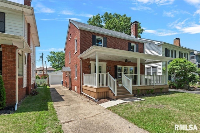 1829 S Walnut St, Springfield, IL 62704 - view of front of home with brick siding, covered porch, an outdoor structure, a front yard, and a detached garage
