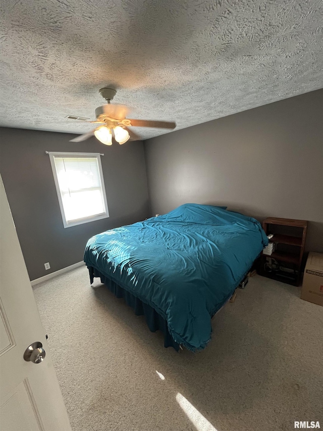 28 Albion St, Lynnville, IL 62650 - bedroom with carpet flooring, ceiling fan, and a textured ceiling
