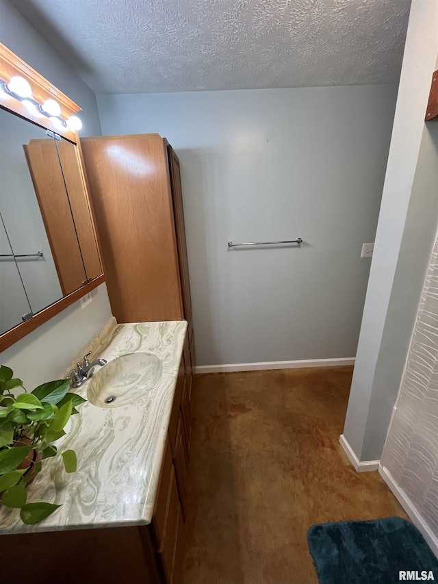 28 Albion St, Lynnville, IL 62650 - bathroom featuring vanity and a textured ceiling