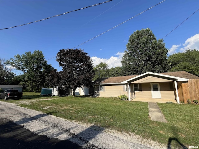 28 Albion St, Lynnville, IL 62650 - view of front facade with a front lawn and a porch