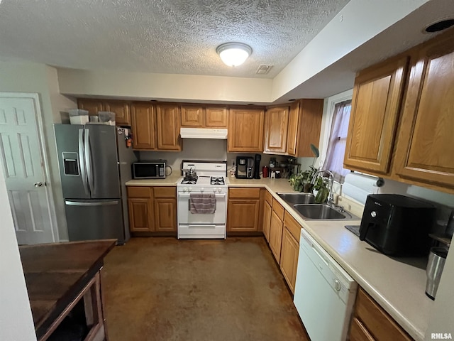 28 Albion St, Lynnville, IL 62650 - kitchen featuring appliances with stainless steel finishes, under cabinet range hood, light countertops, a textured ceiling, and brown cabinets