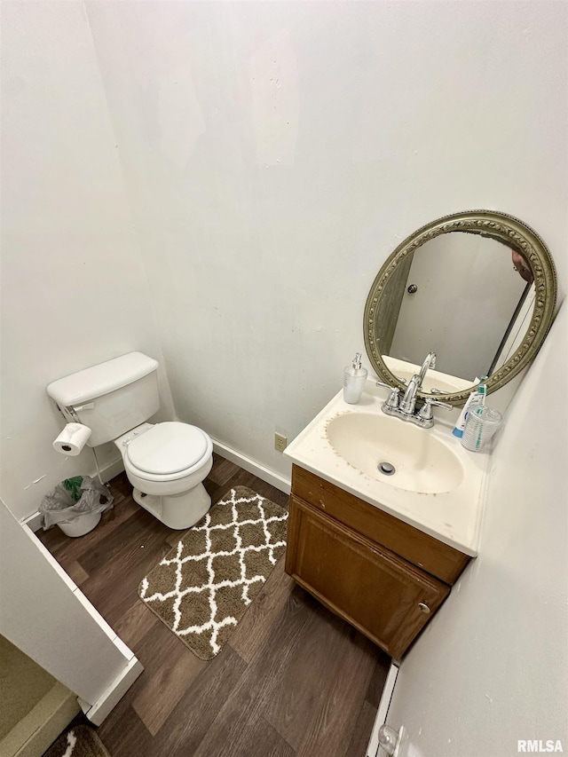 311 Main St, Meredosia, IL 62665 - bathroom with wood finished floors and vanity