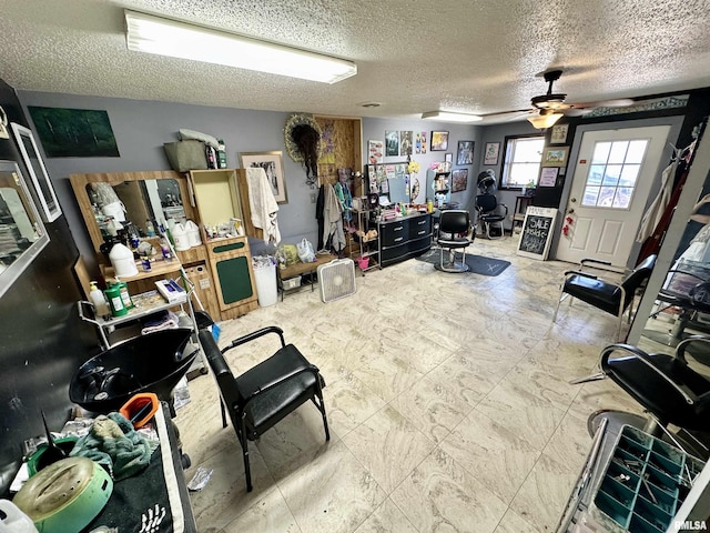 311 Main St, Meredosia, IL 62665 - miscellaneous room featuring ceiling fan and a textured ceiling